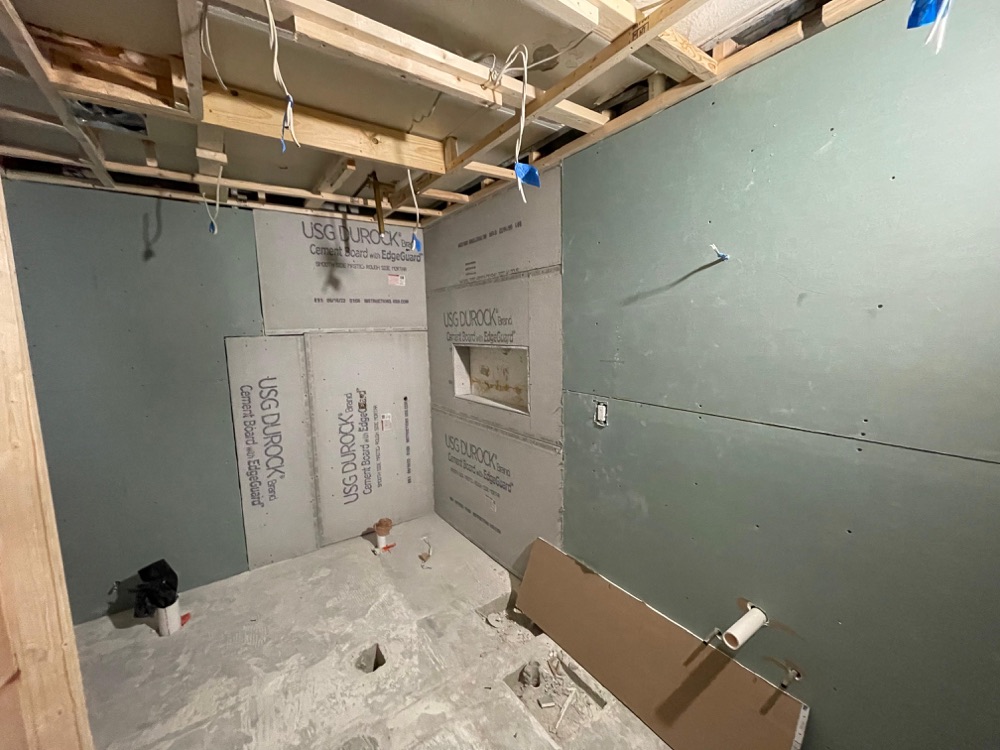 Cement board installed on bathroom walls